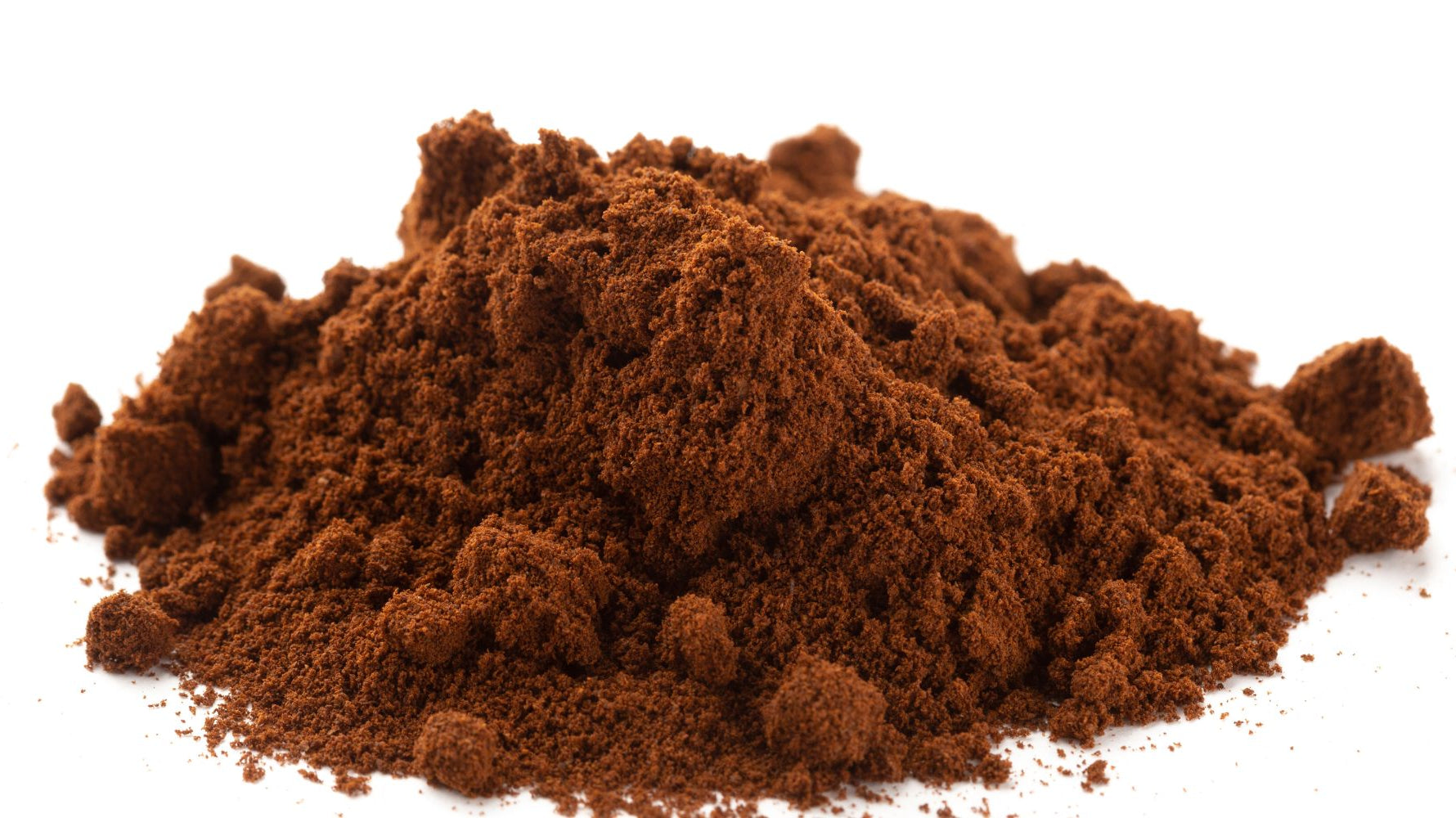 Freshly ground coffee beans in portafilter"