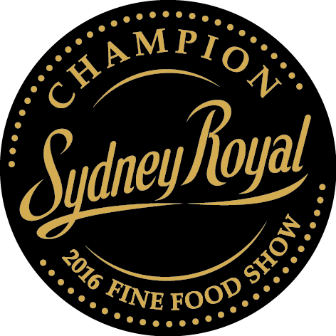 Gold circular emblem featuring "Champion Sydney Royal 2016 Fine Food Show" text.