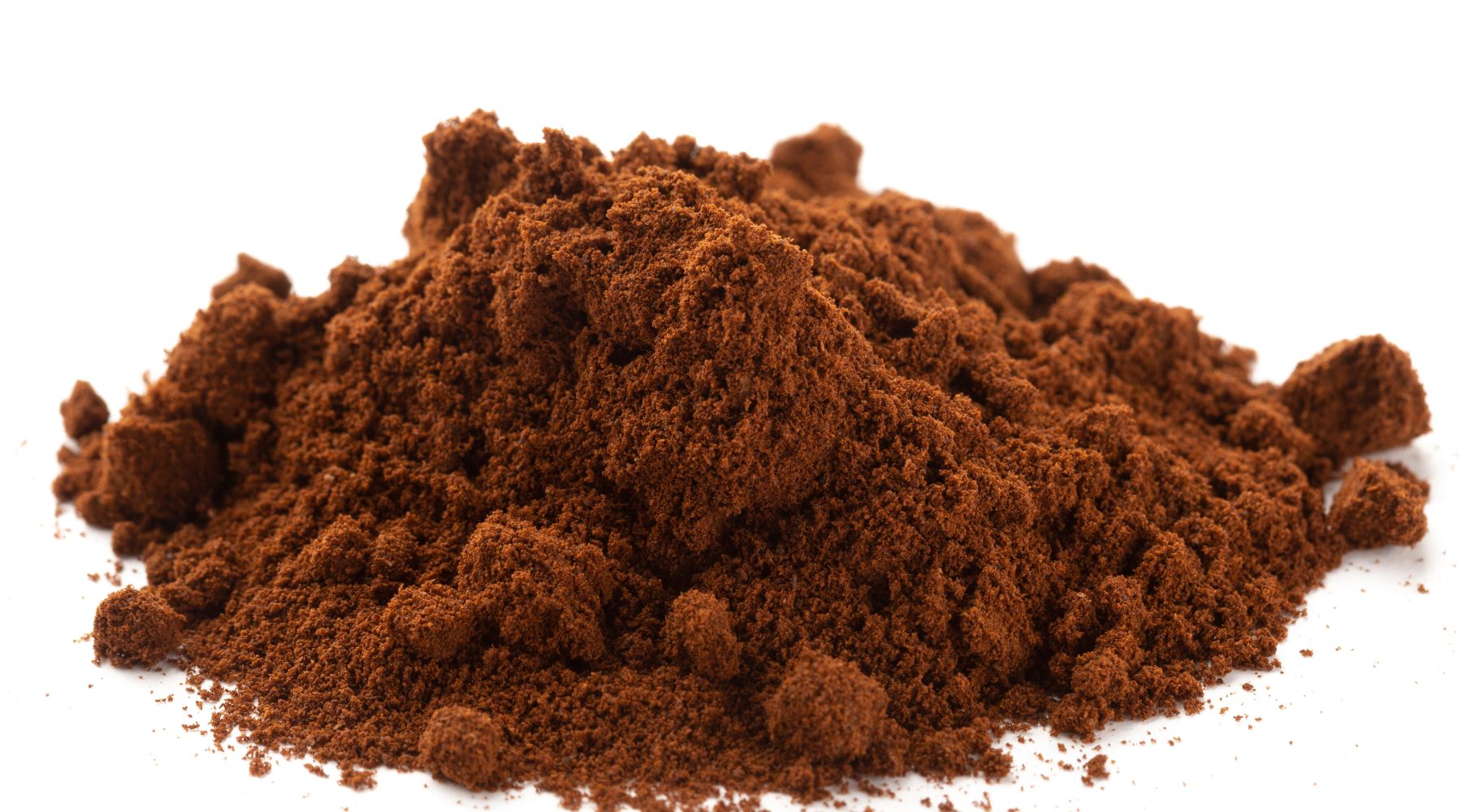 Freshly ground coffee beans in portafilter"